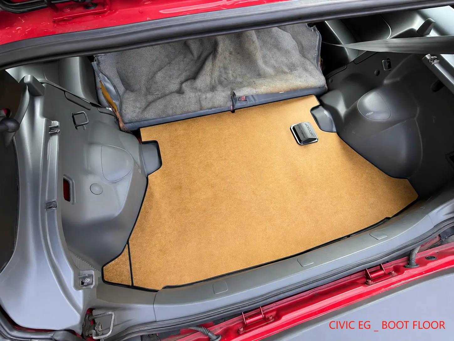 Boot floor installed in a Civic EG, seats up