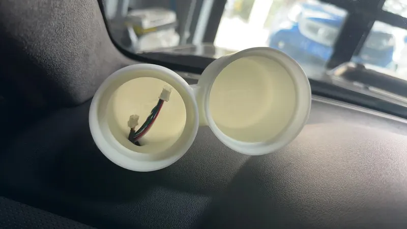 Dual 52mm gauge pod sitting on a Subaru dash